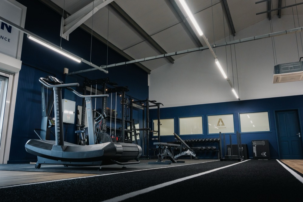 Treadmills and strength equipment in the bespoke gym at Ascension Physiotherapy & Performance